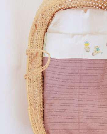 Soft baby cotton blanket with delicate patterns, perfect for the transitioning seasons from winter to spring.