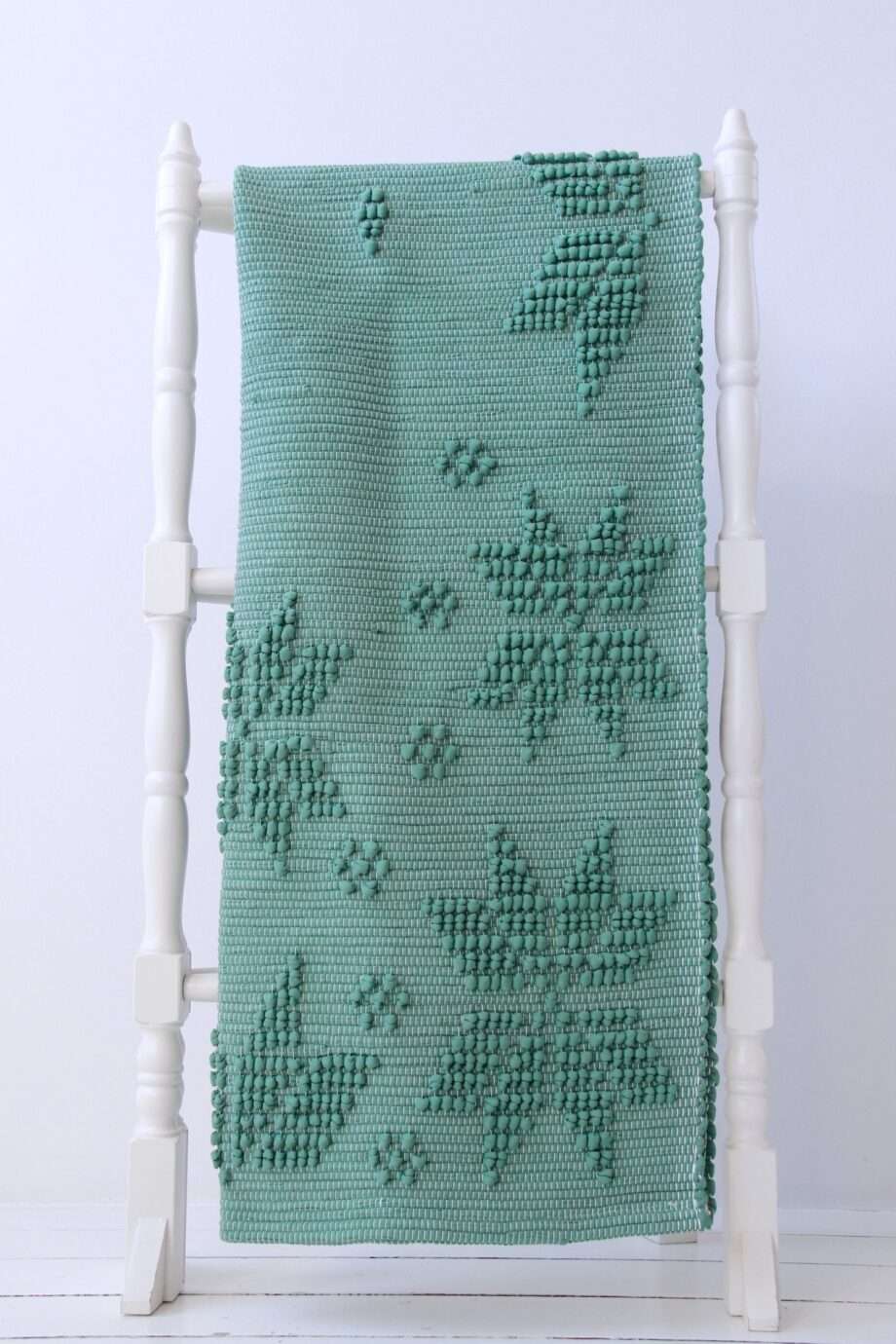 snowflakes green woven cotton rug medium